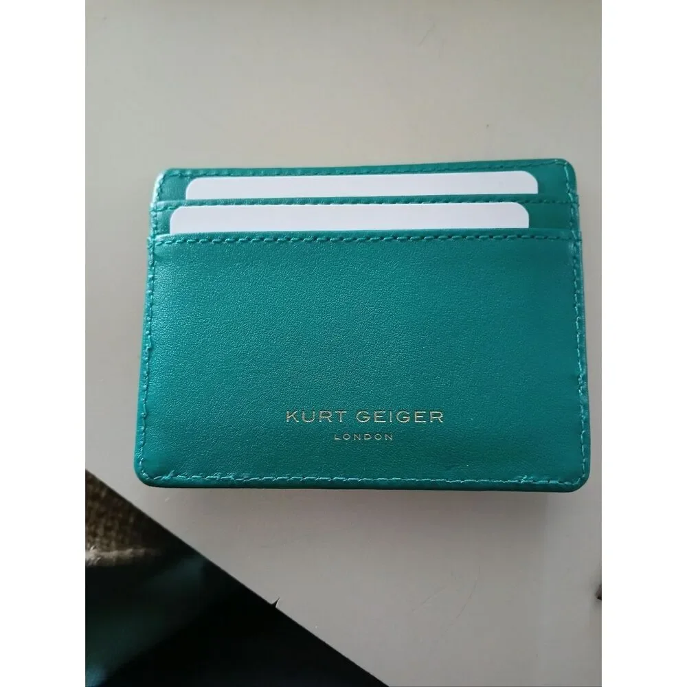Kurt Geiger teal card holder with gold-tone beetle detail. Orange available too